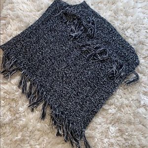 Black,gray, and white poncho